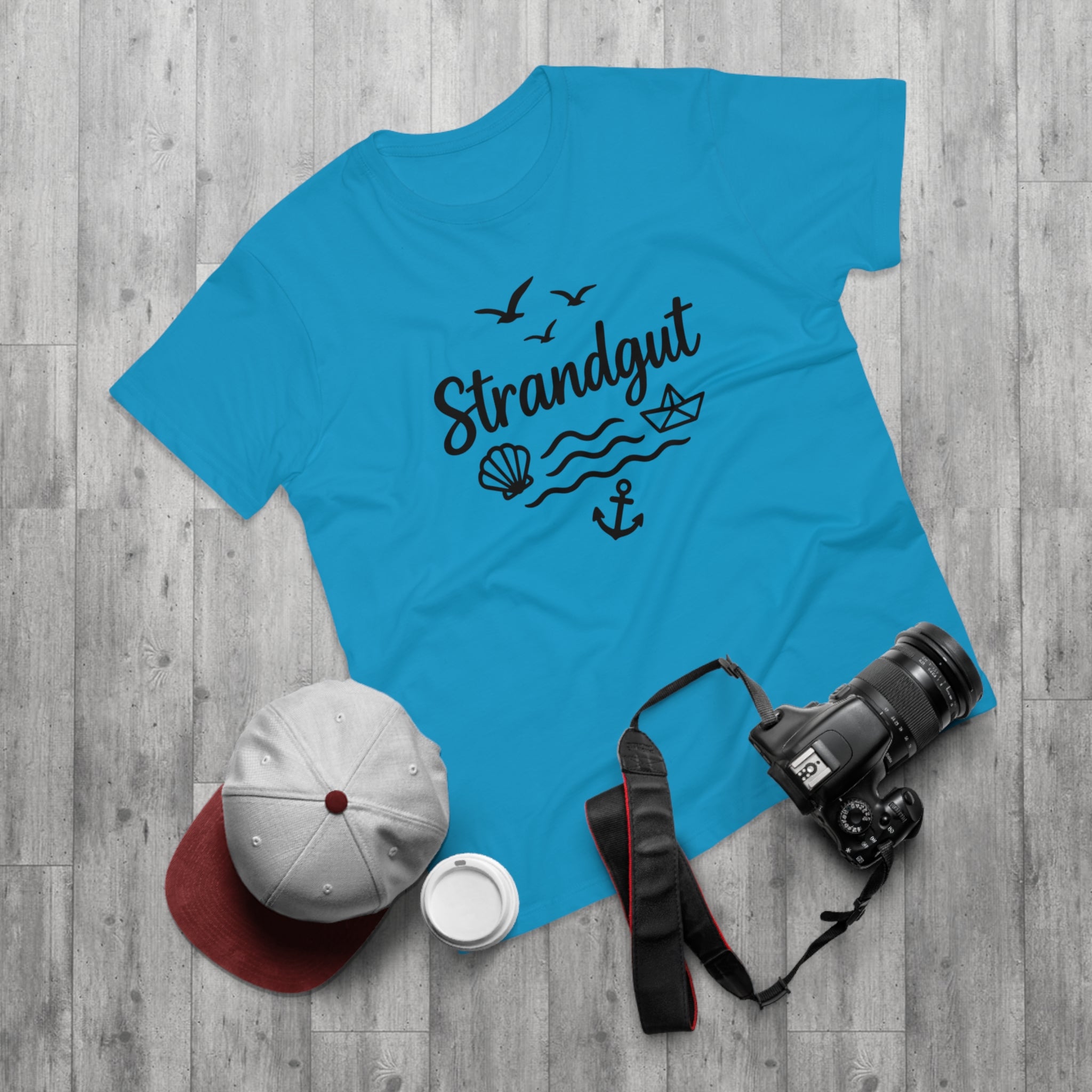 Strandgut T-Shirt – Maritimes Shirt mit Muschel, Anker & Papierboot – Küstenmode